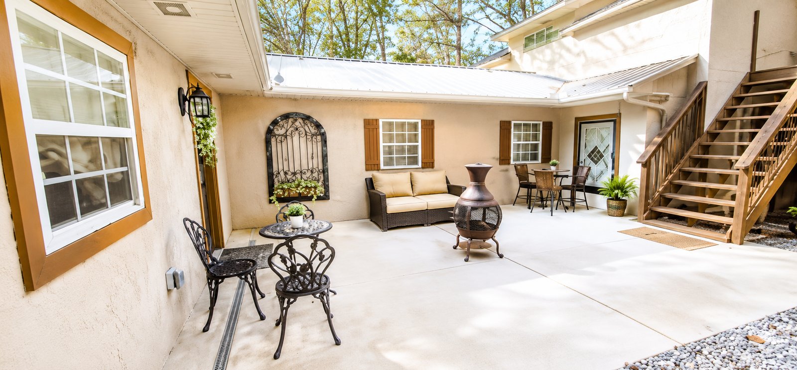 Villa Serena courtyard with outdoor seating and fire feature
